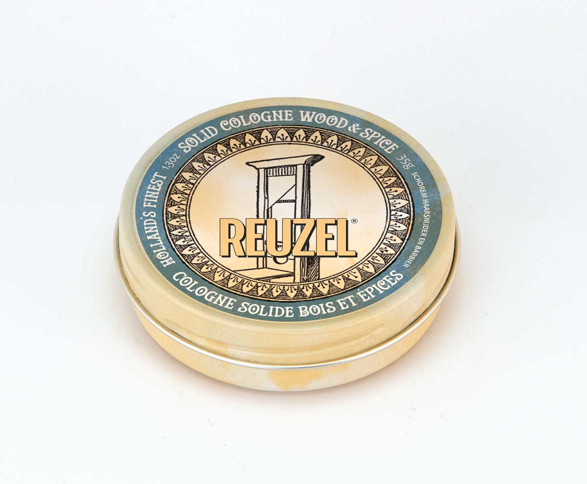 Reuzel Wood & Spice Solid Cologne Balm for beard grooming, with a natural wood and spice scent in a compact balm container.