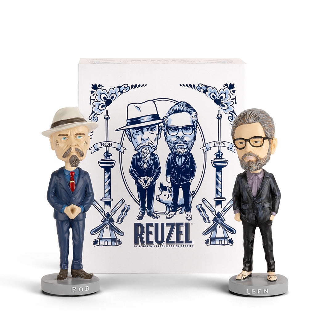 Reuzel Founders' Bobble Heads featuring two collectible figurines with detailed faces and branded attire, perfect for display. Rob & Leen